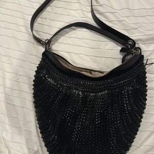 Black Woven Hobo Bag with Curved Shape and Leather Strap